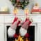 Glitzhome® Marquee LED Gingerbread House & Gingerbread Man Christmas Stocking Holder Set